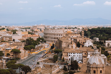 Panoramic view of city Rome with Roman forum and Colosseum from Vittoriano