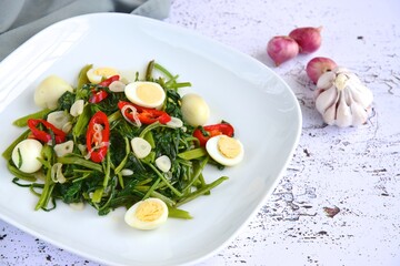 Tumis Kangkung Telur Puyuh (Stir-fried Water Spinach with Quail Eggs)