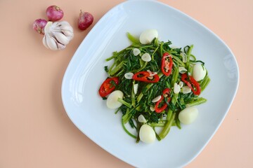 Tumis Kangkung Telur Puyuh (Stir-fried Water Spinach with Quail Eggs)