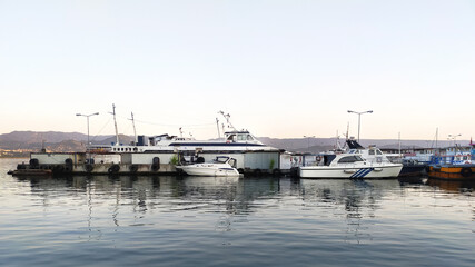 Fototapeta na wymiar Izmit port and boats at the pier landscape.