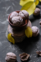 walnuts on a black background