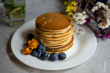 pancakes with honey and berries