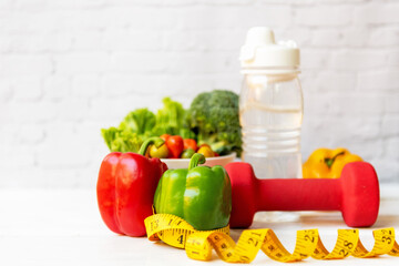 Diet Healthy food and lifestyle health concept. Sport exercise equipment workout