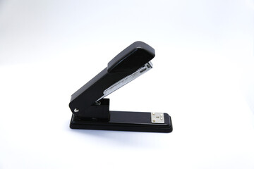 Manual stapler, a tool that allows you to staple a sheet of paper or cardboard through a piece of wire called a staple.