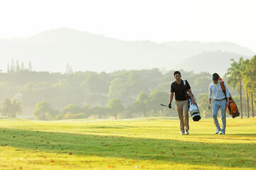 Group golf professional Golfer asian man walking in fairway with bag golf at golf  club.  