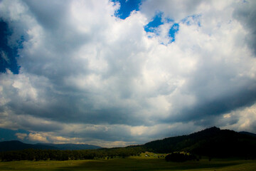 landscape with mountains and clouds
