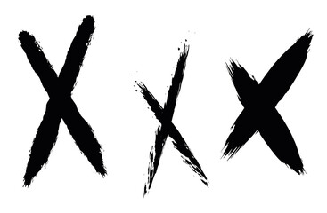 Set of crosses in grunge style. Paint strokes with a dry brush