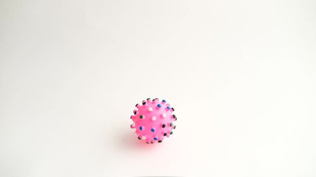 imitation of a virus in the form of a toy rolls on a white background - Powered by Adobe