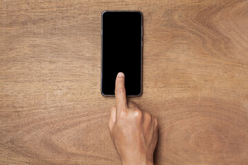 Hand touching the screen smart phone or mobile phone. Technology and communication concept