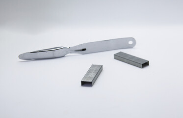 Staple puller a supply to easily remove the staple without getting hurt, usually used in the office or as school supplies