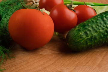 Still life, salad products on a wooden board