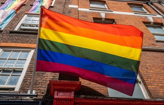 A large freedom flag flying on Old Compton Street in Central London during Gay Pride week 2020