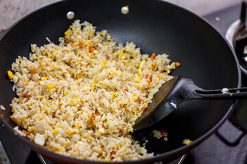 Fried rice with eggs in a pan,Easy cooking, Thai style
