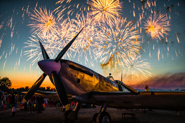 Fireworks light up the sky behind a Spitfire at Blenheim Palace during a Great British event.