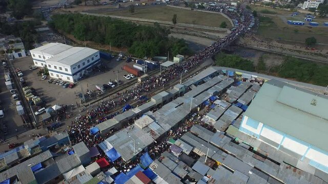 Aerial static shot of people crossing borde at Dajabon. Dominican Republic