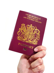 A Woman holding a British National Oversea (BNO) Passport 