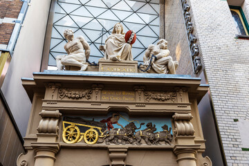 Sculpture in a facade in Amsterdam, Netherlands