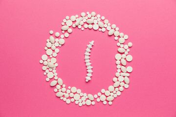 Human spine on pink background. Health of back, neck and lower back. Treatment of skeletal diseases.