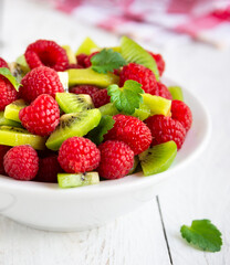 Fresh fruit salad with with raspberry and kiwi