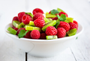 Fresh fruit salad with with raspberry and kiwi