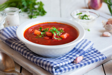 Vegetable soup borsch made with beetroot and other vegetables