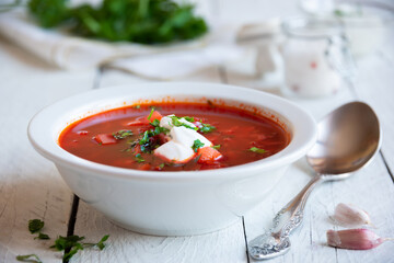 Vegetable soup borsch made with beetroot and other vegetables