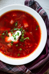 Vegetable soup borsch made with beetroot and other vegetables