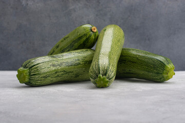 Zucchini on the table close-up. Free space for inscription.