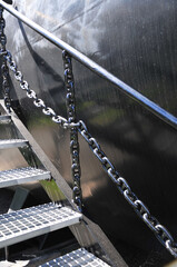 Railings and chain on old submarine.