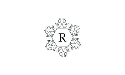 Elegant logo with ornament and letter R. Black logo on a white background concept for business, jewelry, fashion, cafe, hotel and others.