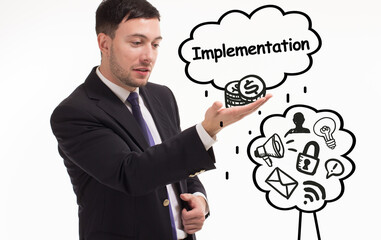 Business, technology, internet and network concept. Young businessman thinks over the steps for successful growth: Implementation