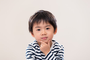 Handsome asian kid on white background