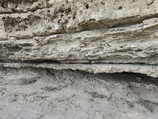 Laminated wall made of gray stone. Porous stone .. Saharna.-Moldova.