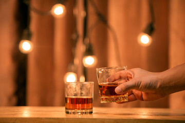 Barman pouring whiskey whiskey glass beautiful night
