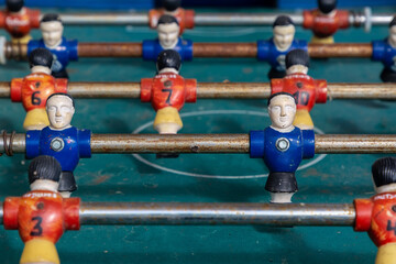 Old retro figures for playing table football.