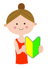 初心者マークを持つ若い困り顔の女性