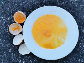 the damaged eggs in the bowl