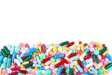 Fototapeta na wymiar Colorful pills isolated on white background