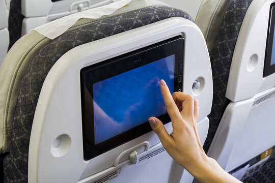 Traveling airplane and using touchscreen In-flight Entertainment