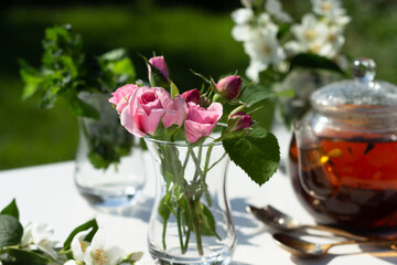 Obraz na płótnie Canvas Ingredients for Herbal tea with rose, jasmine and mint.