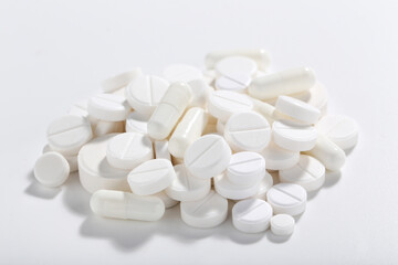 Fototapeta na wymiar Medicine pills on white background