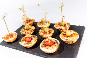 Tartelettes with pears, mushrooms and brie cheese 