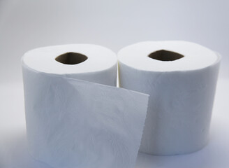 Toilet paper is a type of thin, absorbent paper used for sanitary and personal hygiene. Its use is more common for intimate cleansing after defecating or urinating