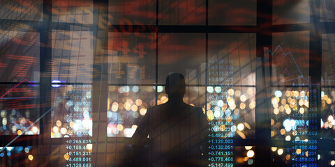 Silhouette of businessman looking on night metropolis, collage with finance info on imaginary screen