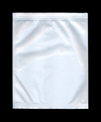 A blank white plastic bag, used for shipping or storage of small items, isolated on a black surface. An empty canvas for your own writings or drawings.
