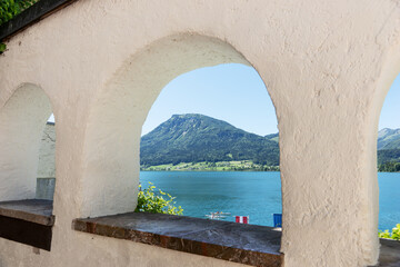 Fototapeta na wymiar Wolfgangsee lake and mountains view from the window. Austria. Summer day