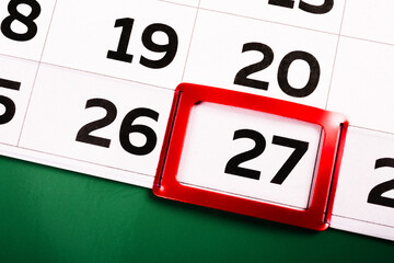 The number 27 on the calendar is highlighted in red. The twenty-seventh day of the month. Agenda...