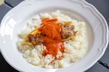 pepper filled with minced meat with tomato sauce and rice