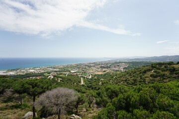 Panoramic view of Barcelona and the Maresme. Made from Premia de Dalt. Sunny day with some decorative clouds.