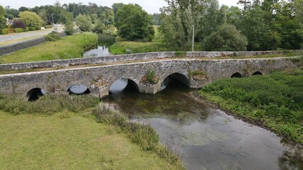 Fototapeta na wymiar An Old Bridge Over a River in Ireland.